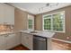Kitchen with granite countertops, modern stainless steel appliances, and hardwood floors at 1819 Brompton Ct, Newton, NC 28658