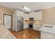 Modern kitchen featuring stainless steel appliances, granite countertops, and white cabinets at 1819 Brompton Ct, Newton, NC 28658