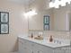 Spacious bathroom boasts double sinks, a large mirror, and ample counter space at 20312 Deep Cove Ct, Cornelius, NC 28031