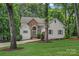 Stunning two-story home with stone accents, landscaped yard, and a charming entrance at 20312 Deep Cove Ct, Cornelius, NC 28031