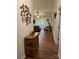 Hallway leading to the living room featuring hard wood floors at 205 Wellington Hills Cir # 205, Salisbury, NC 28147