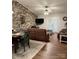 Open concept living and dining area with hardwood floors and abundant natural light, showcasing a comfortable seating area at 205 Wellington Hills Cir # 205, Salisbury, NC 28147