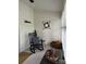 Enclosed porch with white walls, black rocking chair, neutral carpet and multiple decorations at 205 Wellington Hills Cir # 205, Salisbury, NC 28147