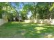 Large, lush backyard with a new wooden fence and plenty of green space at 210 E 5Th Ave, Gastonia, NC 28054