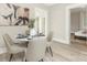 Cozy dining area with modern chairs, a stylish table, and lots of natural light at 210 E 5Th Ave, Gastonia, NC 28054