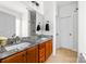 Bathroom with a double sink vanity, granite countertops, and matching mirrors at 212 Victoria Cir, York, SC 29745