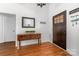 Inviting entryway with wood floors, console table, mirror, and decorative accents at 212 Victoria Cir, York, SC 29745