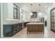 Modern kitchen featuring custom cabinets, marble countertops, and stainless steel appliances at 2412 Kingsbury Dr, Charlotte, NC 28205