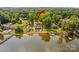 Aerial view highlighting home's location with lake access and lush surroundings at 270 Yachtsman Dr, Salisbury, NC 28146