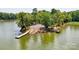 Aerial view of the boat launch and lake, with a dock at 270 Yachtsman Dr, Salisbury, NC 28146