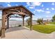 Backyard gazebo with a fire pit, offering stunning views of the lake at 270 Yachtsman Dr, Salisbury, NC 28146