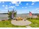 Outdoor patio area features a fire pit with lake view, ideal for relaxation and entertaining at 270 Yachtsman Dr, Salisbury, NC 28146