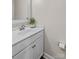 Bathroom featuring a white vanity with double sinks and a decorative mirror at 270 Yachtsman Dr, Salisbury, NC 28146
