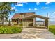 Waterfront home featuring a covered carport and a path leading to the lake at 270 Yachtsman Dr, Salisbury, NC 28146