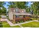 Charming two-story home showcasing a covered front porch, manicured landscaping, and inviting curb appeal at 270 Yachtsman Dr, Salisbury, NC 28146
