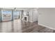 Bright living room featuring a fireplace, hardwood floors, and sliding glass doors to a lake view deck at 270 Yachtsman Dr, Salisbury, NC 28146