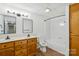 Well-lit bathroom with double vanity, and a shower-tub combo at 3090 Goblet Rd, Richburg, SC 29729