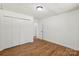 Bright bedroom features hardwood floors, closet, and neutral paint at 3090 Goblet Rd, Richburg, SC 29729