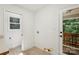 The laundry room has tiled floors, utility hookups, and a door to the backyard at 3090 Goblet Rd, Richburg, SC 29729