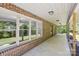 Outdoor covered brick patio with an view of the landscaped yard at 3090 Goblet Rd, Richburg, SC 29729