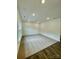 Spacious living room featuring plush carpet and ample natural light from a large window at 353 Jetton St, Davidson, NC 28036
