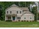 Charming two-story home with a well-manicured lawn and inviting blue front door at 360 Sundown Rd, Mooresville, NC 28117