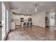 Bright, open kitchen featuring stainless steel appliances and a center island at 360 Sundown Rd, Mooresville, NC 28117