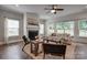Cozy living room with fireplace, plush rug, and stylish furniture at 360 Sundown Rd, Mooresville, NC 28117
