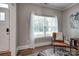 Cozy office space with natural light, hardwood floors and leather chair at 360 Sundown Rd, Mooresville, NC 28117