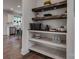 Convenient butler's pantry with open shelving and stylish decor at 360 Sundown Rd, Mooresville, NC 28117