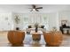 Bright and airy living room featuring hardwood floors, neutral colors and a ceiling fan at 3801 Rea Rd, Charlotte, NC 28226
