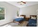 Bedroom with carpet, two twin beds, and multiple windows at 4121 Cedar Point Ave # 28, Stallings, NC 28104