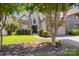 Charming home featuring a stone and vinyl exterior, well-manicured lawn, and a two-car garage at 4121 Cedar Point Ave # 28, Stallings, NC 28104