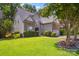 Charming home featuring a stone and vinyl exterior, well-manicured lawn, and a two-car garage at 4121 Cedar Point Ave # 28, Stallings, NC 28104
