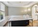 Kitchen island featuring a marble top and ample space, complemented by the kitchen's stylish design at 4121 Cedar Point Ave # 28, Stallings, NC 28104
