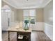 Kitchen island featuring a marble top and ample space, complemented by the kitchen's stylish design at 4121 Cedar Point Ave # 28, Stallings, NC 28104