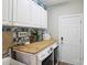 Well-organized laundry room with modern washer, dryer, and cabinet storage at 4121 Cedar Point Ave # 28, Stallings, NC 28104