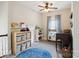 Bright and carpeted playroom featuring lots of natural light, toy storage, and neutral walls at 4121 Cedar Point Ave # 28, Stallings, NC 28104