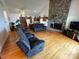 Comfortable living room with vaulted ceiling and rustic stone fireplace at 4574 Ivy Run Ln, Denver, NC 28037
