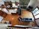 Spacious home interior featuring a stone fireplace, wooden cabinets, and hardwood floors at 4574 Ivy Run Ln, Denver, NC 28037