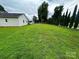 Spacious, green yard next to a well-maintained home at 4574 Ivy Run Ln, Denver, NC 28037