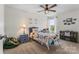 Charming bedroom with ceiling fan, lots of natural light, and colorful décor at 515 Benford Ln, Stanley, NC 28164
