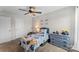 Inviting bedroom with a ceiling fan, and natural light, offering a cozy and serene atmosphere at 515 Benford Ln, Stanley, NC 28164