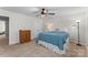 Comfortable bedroom with carpet, ceiling fan, and dresser at 515 Benford Ln, Stanley, NC 28164