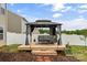 A covered gazebo with comfortable outdoor furniture, perfect for relaxing and entertaining at 515 Benford Ln, Stanley, NC 28164