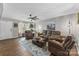 Spacious living room with hardwood floors, a ceiling fan, and comfortable seating, creating an inviting atmosphere at 515 Benford Ln, Stanley, NC 28164