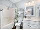 Clean bathroom with a tub/shower combination and updated fixtures at 5927 Leawood Run Ct, Charlotte, NC 28269