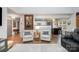 Cozy living area featuring an open floorplan, hardwood floors, and stylish decor for comfortable living at 5927 Leawood Run Ct, Charlotte, NC 28269