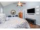 Spacious main bedroom with vaulted ceiling, wall mounted TV, and elegant decor at 5927 Leawood Run Ct, Charlotte, NC 28269