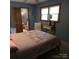 Comfortable bedroom showing en suite bathroom, natural light and quaint design elements at 600 Colby Cir, Salisbury, NC 28147